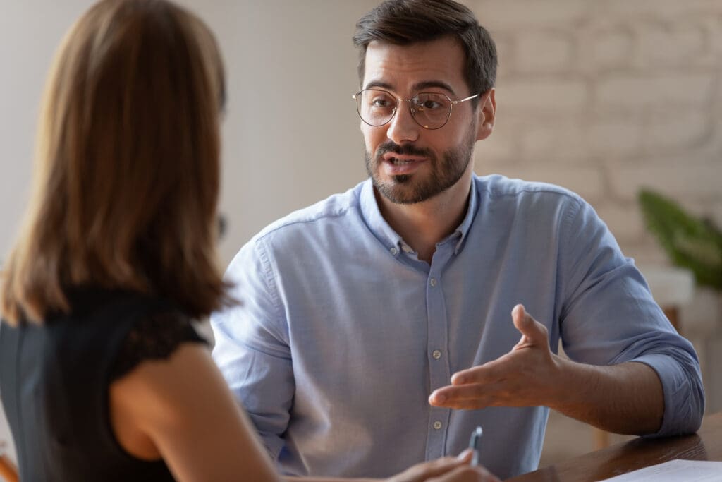 A man and a women have a conversation